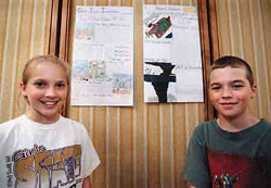 As part of a class project at Newell Elementary, Jordan Ramsey, 11, and Brett Rowley, 11, (right) created their own versions of the 1980 tornado edition of The Grand Island Independent. They said the actual papers took two-to-four days to make, but that they spent two-and-a-half weeks doing research along with their classmates. 